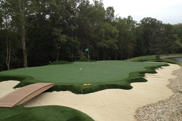 Charlotte artificial putting green with natural surroundings